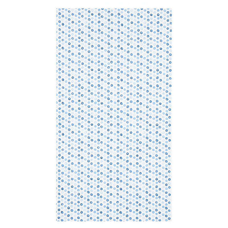 White rectangular fabric with tiny blue polka dots in a repeating pattern.