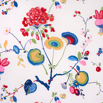 Vibrant floral print with red cluster blossoms, blue and yellow petals, and green stems and leaves.