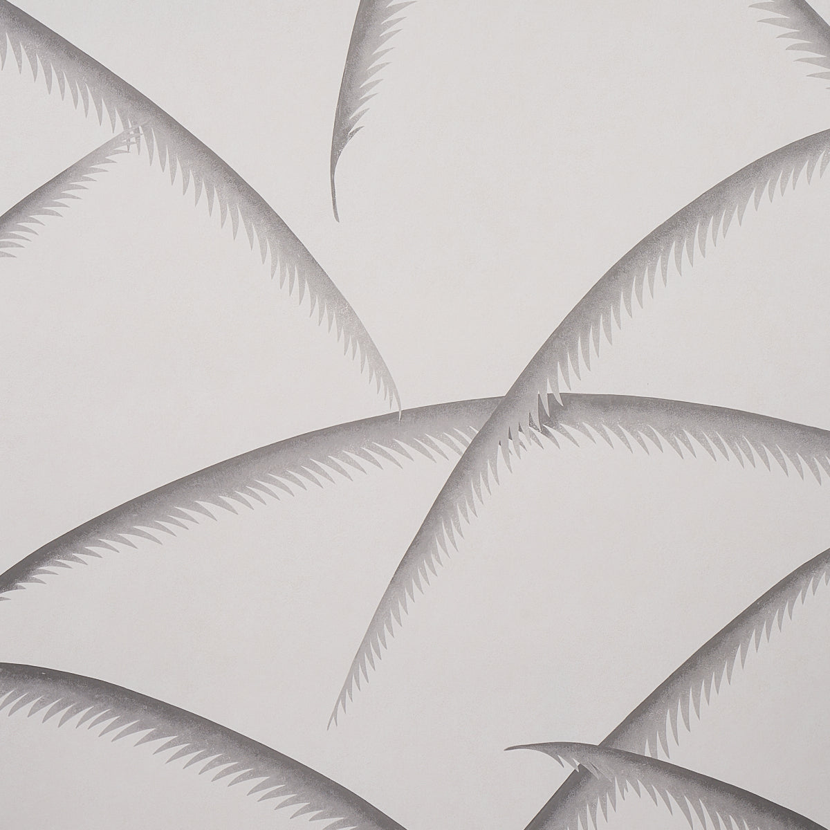 Charcoal palm leaf pattern wallpaper with overlapping fronds on an off-white background.