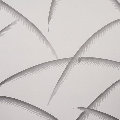 Charcoal palm leaf pattern wallpaper with overlapping fronds on an off-white background.