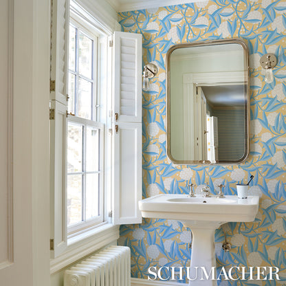 Bright yellow leaf-pattern wallpaper.