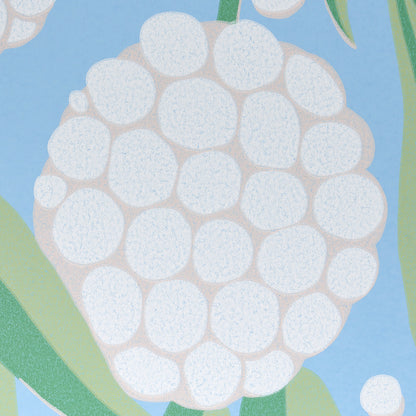 Pastel wallpaper pattern with round white bubble shapes on a blue background and green leaves.