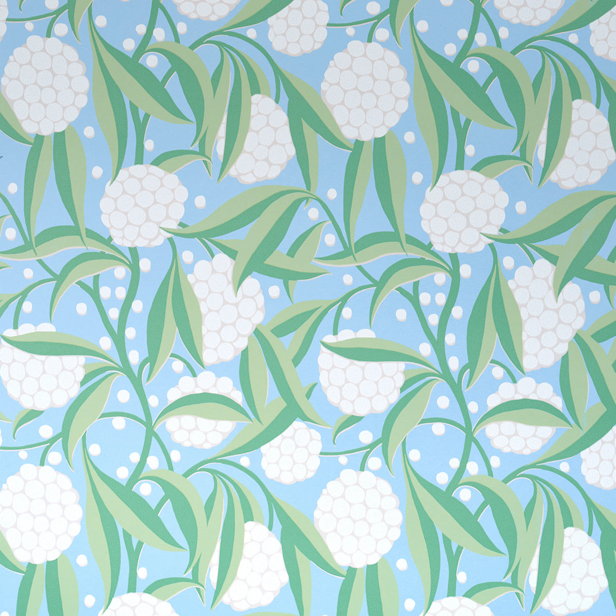 Light blue botanical pattern with white spherical blooms and green leaves; repeating floral textile design.