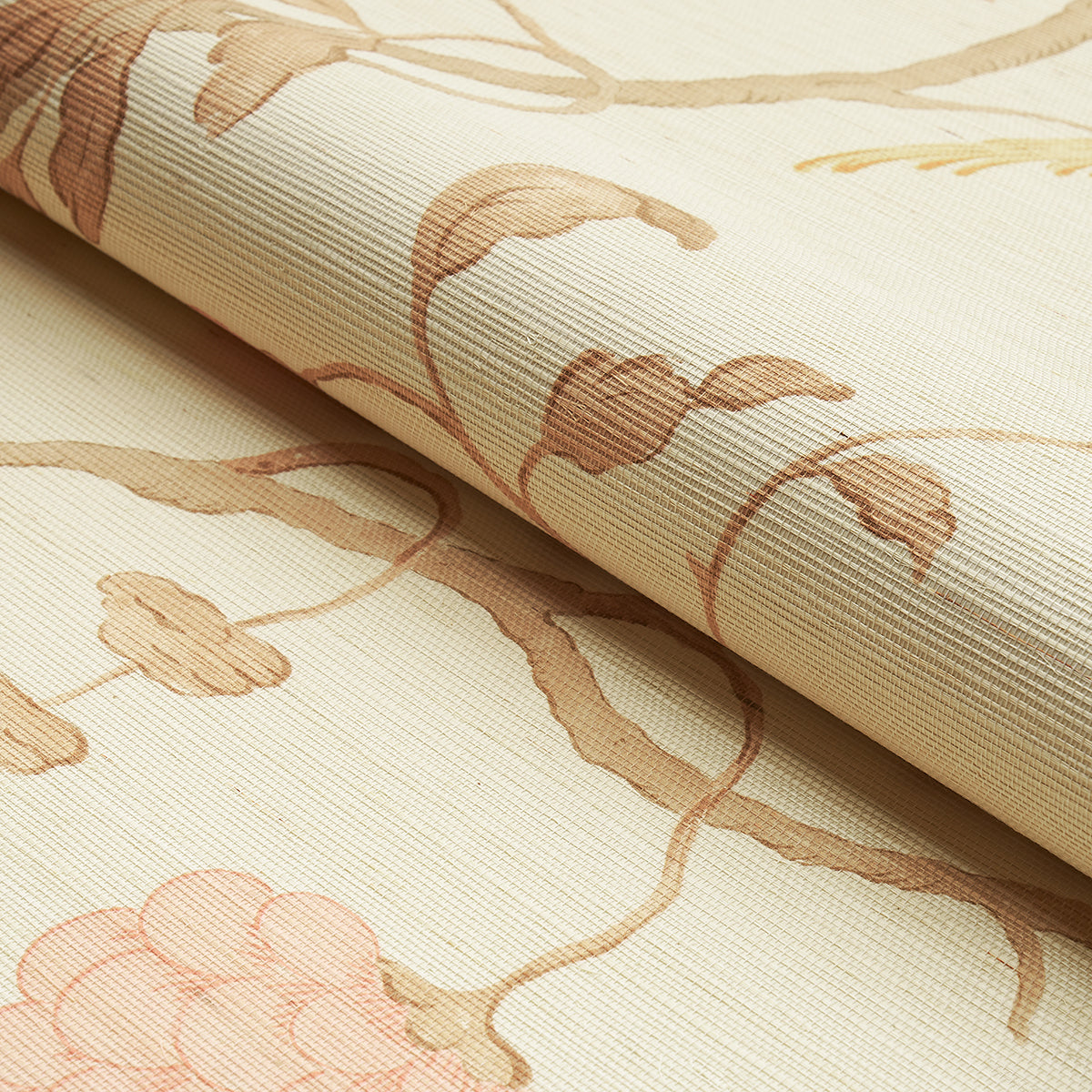Beige fabric roll with soft pinkish-brown floral vine pattern and textured weave.