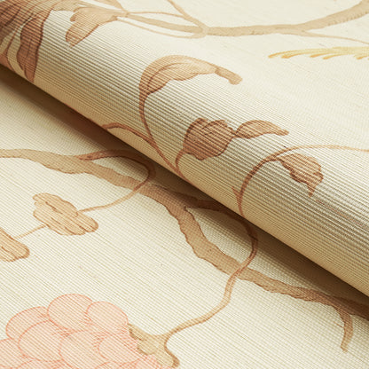 Beige fabric roll with soft pinkish-brown floral vine pattern and textured weave.