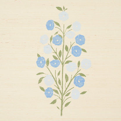 Sisal background with a vertical blue floral bouquet and green stems.