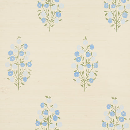 Cream wallpaper with blue floral clusters on olive stems in a repeating botanical pattern.