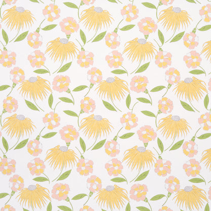 Pastel floral pattern with yellow daisies, pink blossoms and green leaves in a repeating textile print.