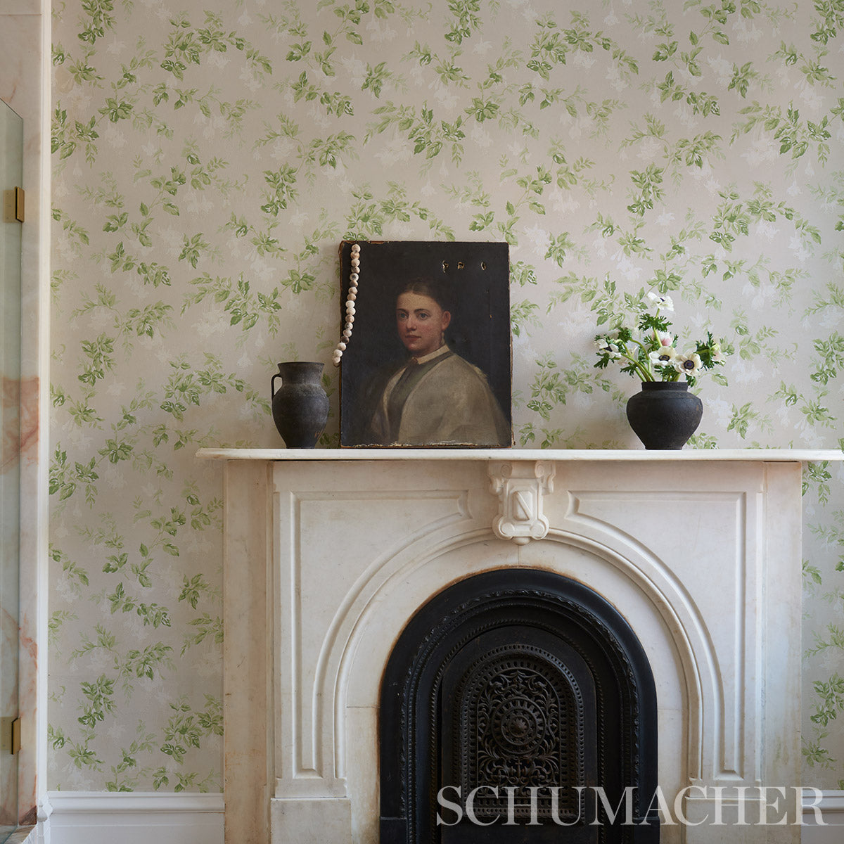 Soft neutral floral wallpaper with a garden gate motif.