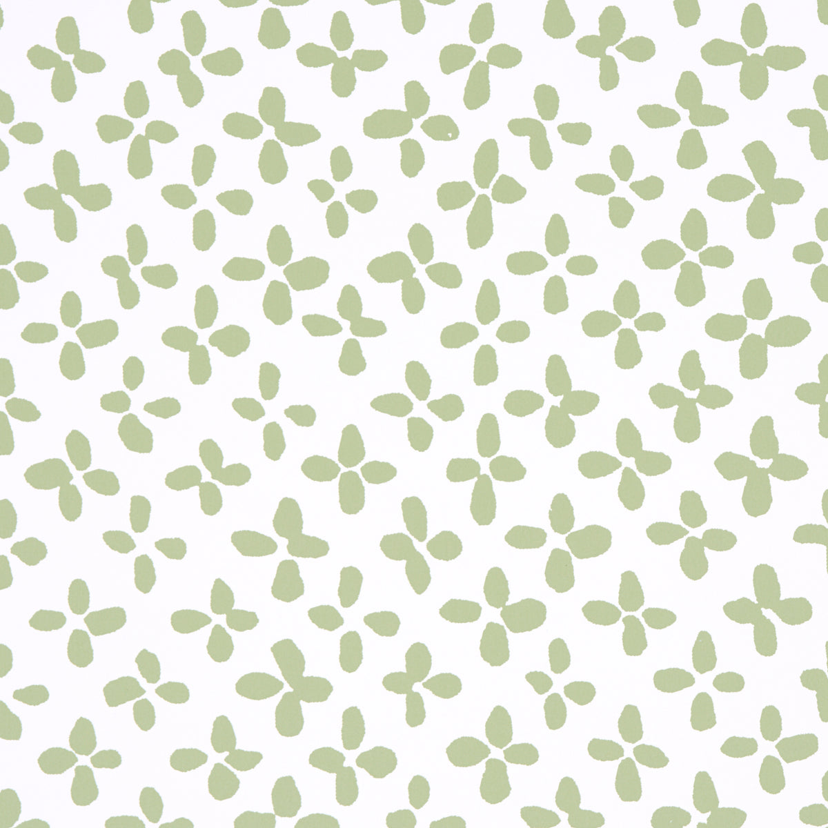 Soft green four-petaled floral motifs in a repeating pattern across an ivory background.