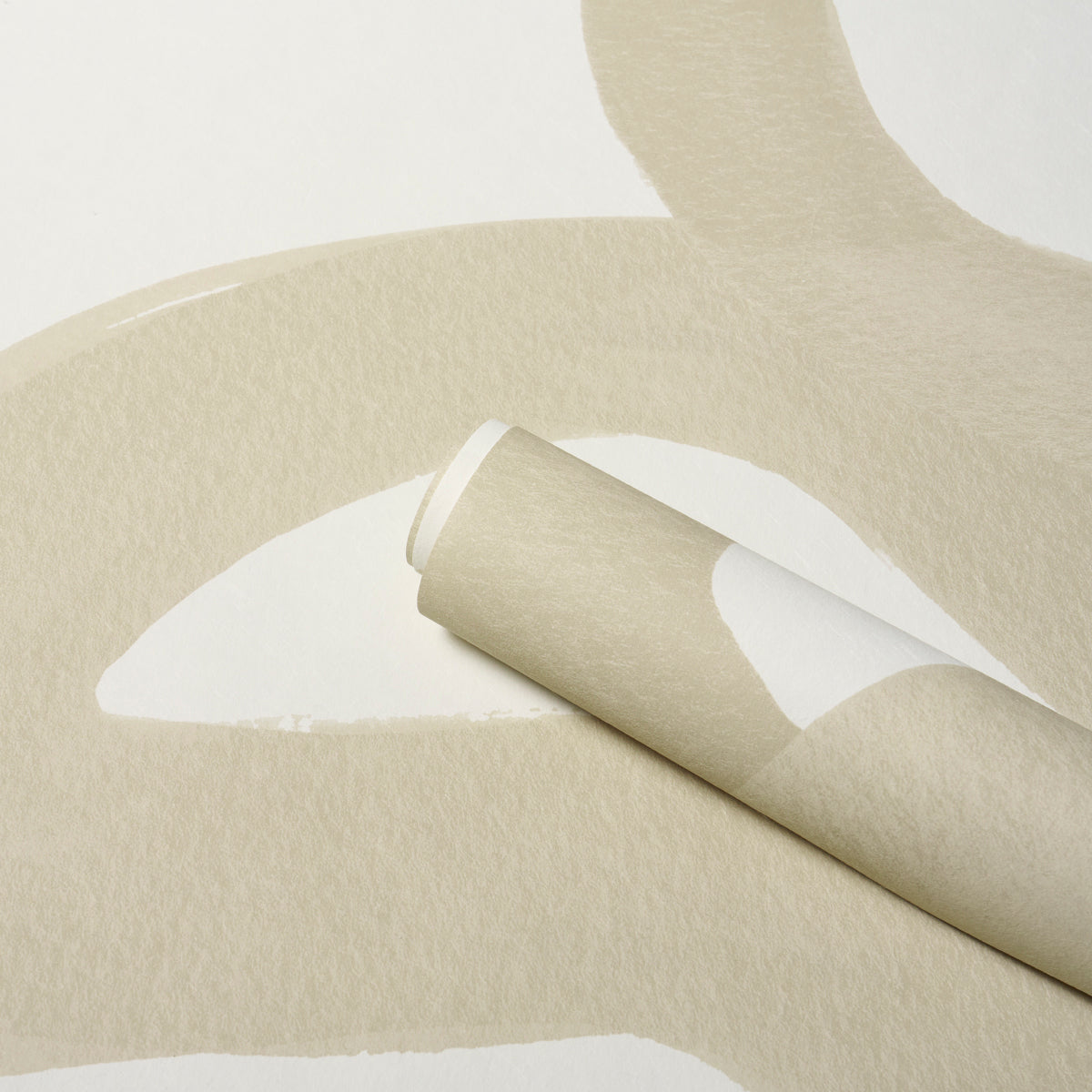 Beige textured wallpaper roll curling away, neutral cream tones, matte finish for walls.