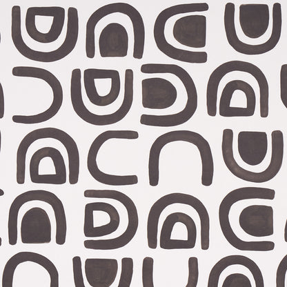 Abstract pattern of dark gray rounded U & arch shapes on a light background; retro geometric fabric print.