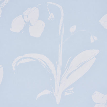 Pale blue wallpaper with white floral silhouettes in a botanical pattern.