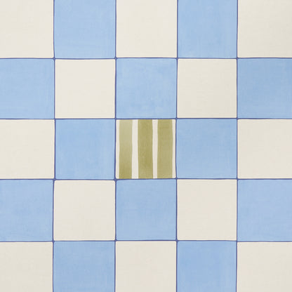 Blue and ivory checkerboard ceramic tiles with a centered olive-striped accent tile.