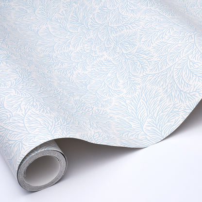 Roll of light blue botanical leaf wallpaper with a delicate pattern on white background
