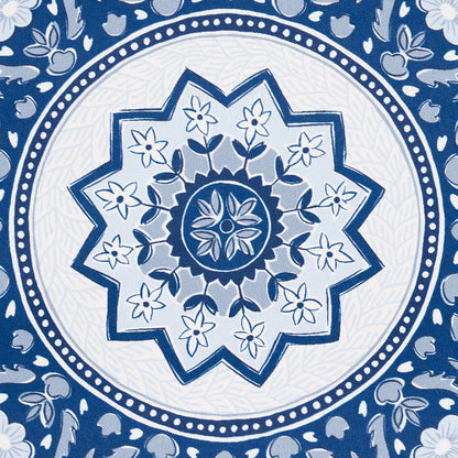 Blue and white ceramic plate with intricate floral mandala pattern; decorative dining plate.