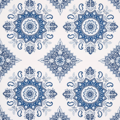 Repeating blue and white mandala pattern with intricate floral and geometric motifs, decorative textile design.