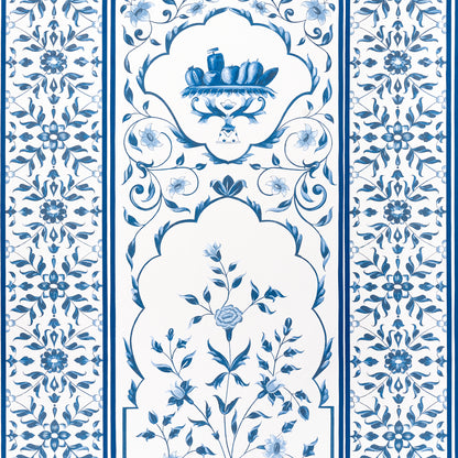 Blue and white tile panel design with a central floral bouquet and ornate border florals.