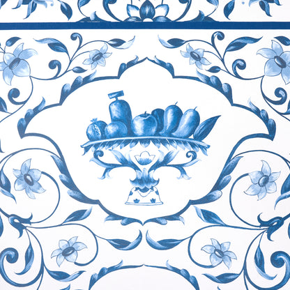 Blue and white Delftware ceramic tile with central fruit basket on a pedestal, surrounded by scrolling floral patterns.