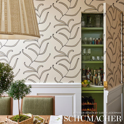 Caterpillar Leaf Wallpaper by Neisha Crosland featuring an elegant black and cream botanical design with unfurling leaf motifs inspired by antique Indian crewelwork. Luxury designer wallpaper for statement walls, living rooms, bedrooms, dining rooms, entryways, powder rooms, and high-end interior design projects with modern classic and eclectic styling.