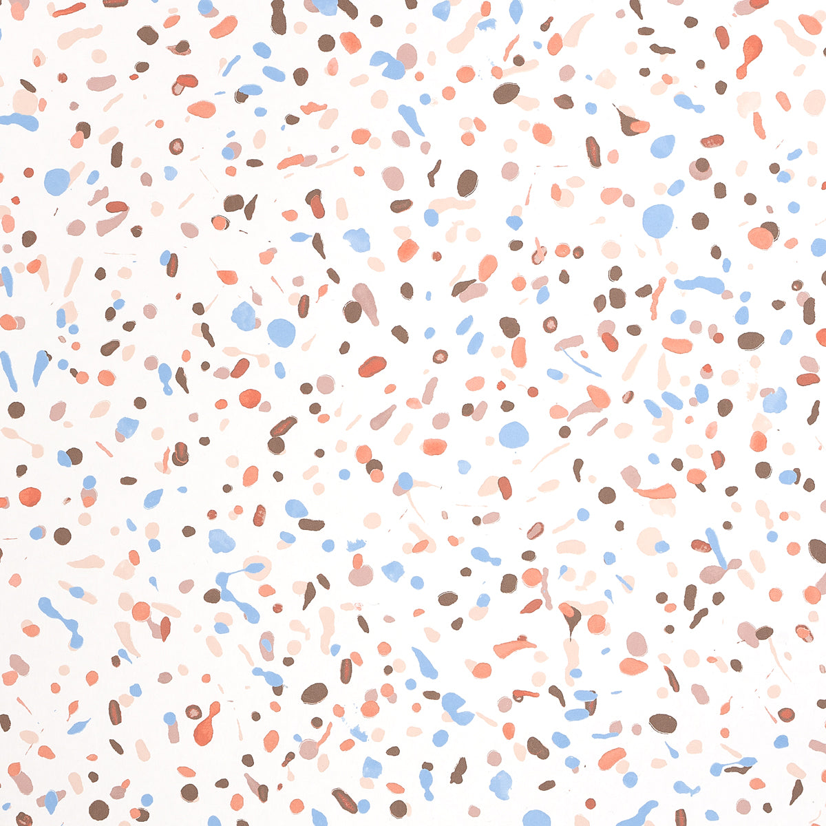 Pastel terrazzo speckle pattern with peach, blue and brown chips on a white background.