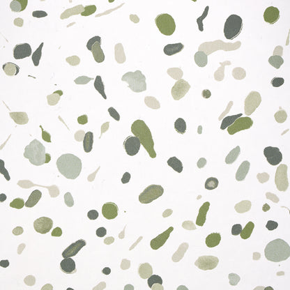 Abstract green and gray watercolor dot pattern on a white backdrop; irregular olive-green blobs and circles.