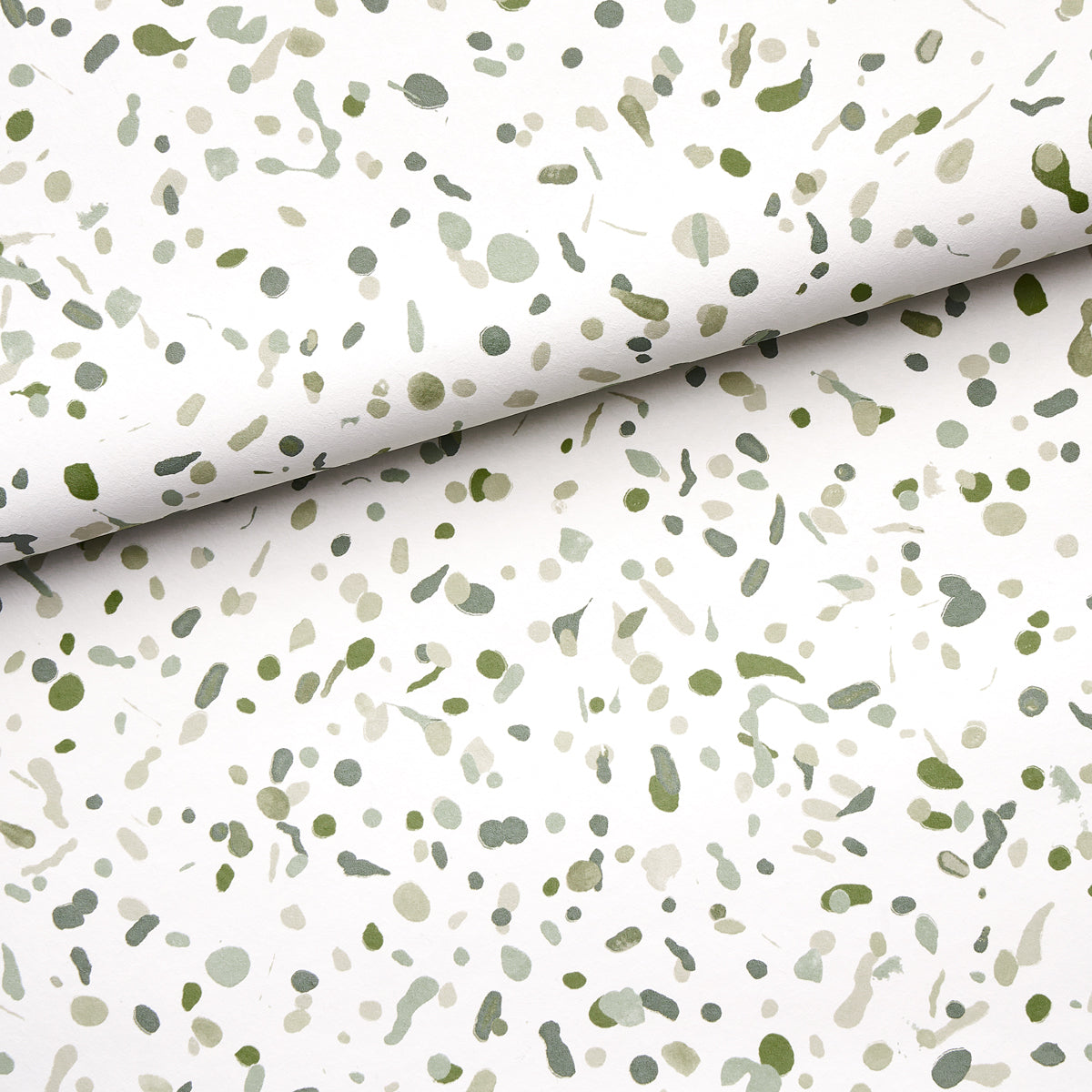 Moss-green backdrop fabric with olive-green speckled confetti pattern; rolled backdrop.