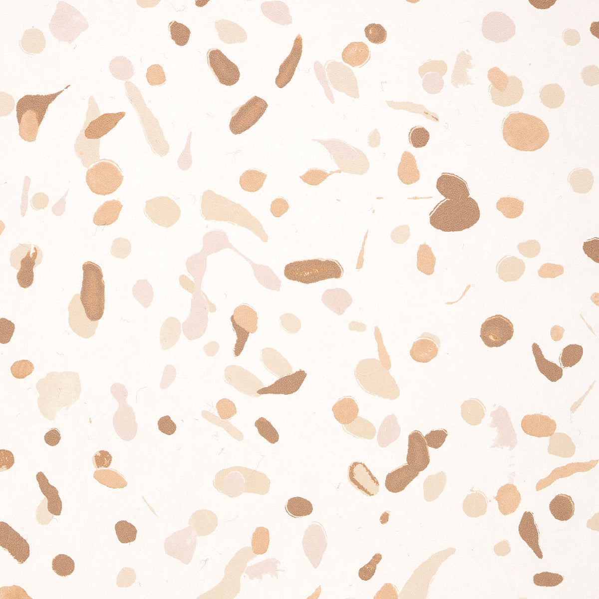 Terrazzo-style pattern with peach, beige and tan chips scattered on a cream background.