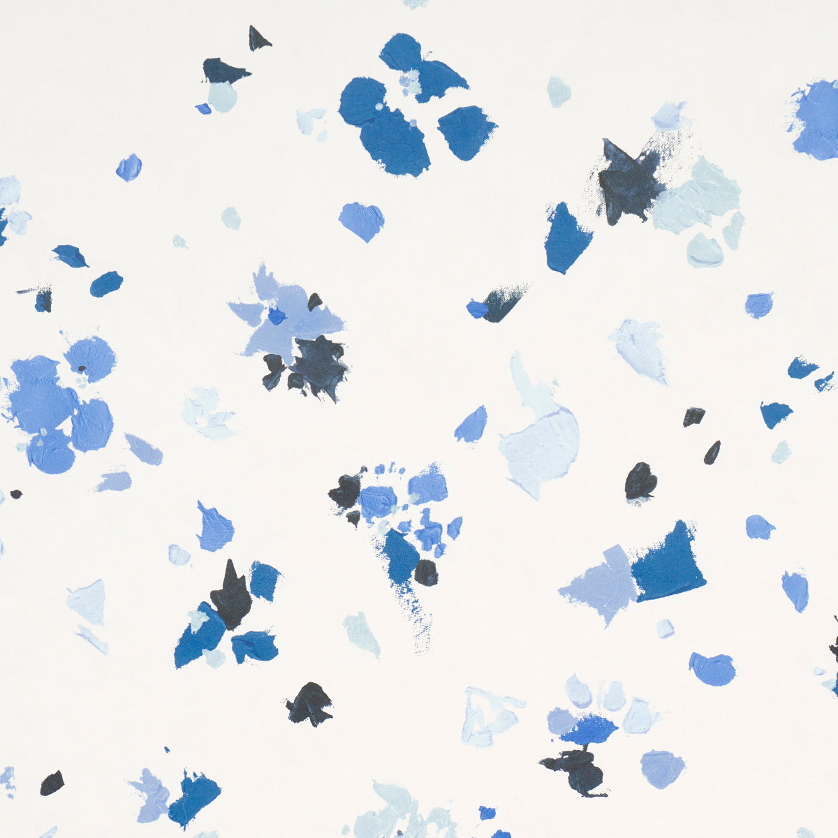 Abstract paint-splatter pattern in blues and grays.