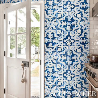 Blue Azulejos tile wallpaper by Mary McDonald for Schumacher, luxury designer wallcovering with Portuguese tile inspired geometric pattern in cobalt and azure, ideal for coastal, Mediterranean, and high-end interior design accent walls.