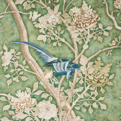 Decorative wallpaper pattern with a blue bird perched on cream peonies among green branches.