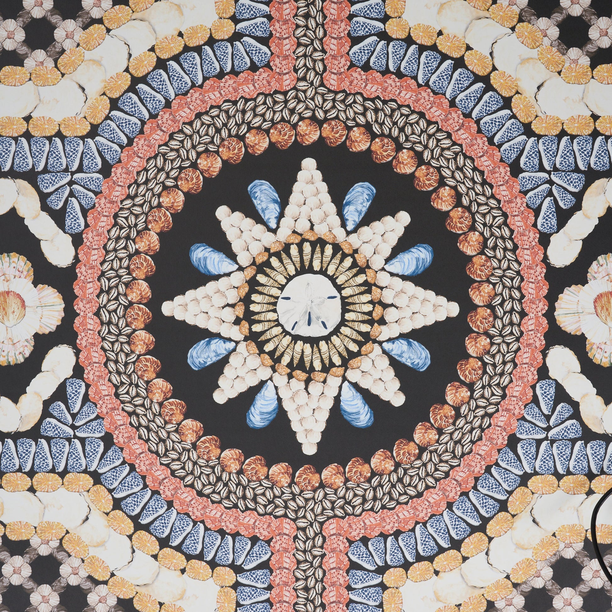 Circular motif pattern on a dark panel fabric in onyx multi colors.