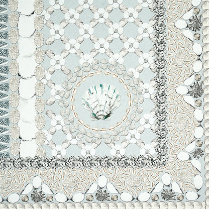 Seafoam panel with white and beige shell motifs on pale blue, arranged in concentric circles and a lattice pattern.