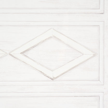 Whitewashed wood cabinet door featuring a diamond-shaped raised inset panel.