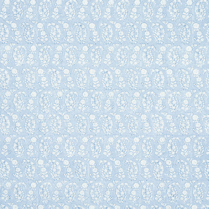 Pale blue fabric with a repeating white floral damask pattern.
