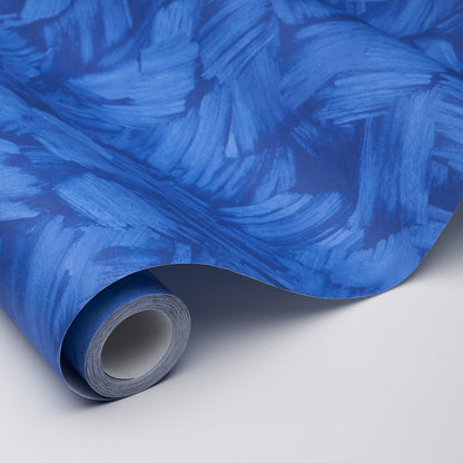 Blue abstract brush-stroke wallpaper roll.