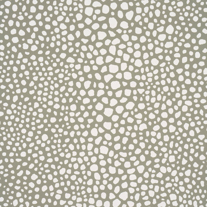 Kelp-colored fabric with cream irregular pebble spots; modern dotted texture for upholstery or wallpaper.