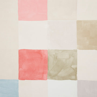 Pastel patchwork quilt fabric with square blocks in pink, cream, white, peach, sage, beige, pale blue, lavender.