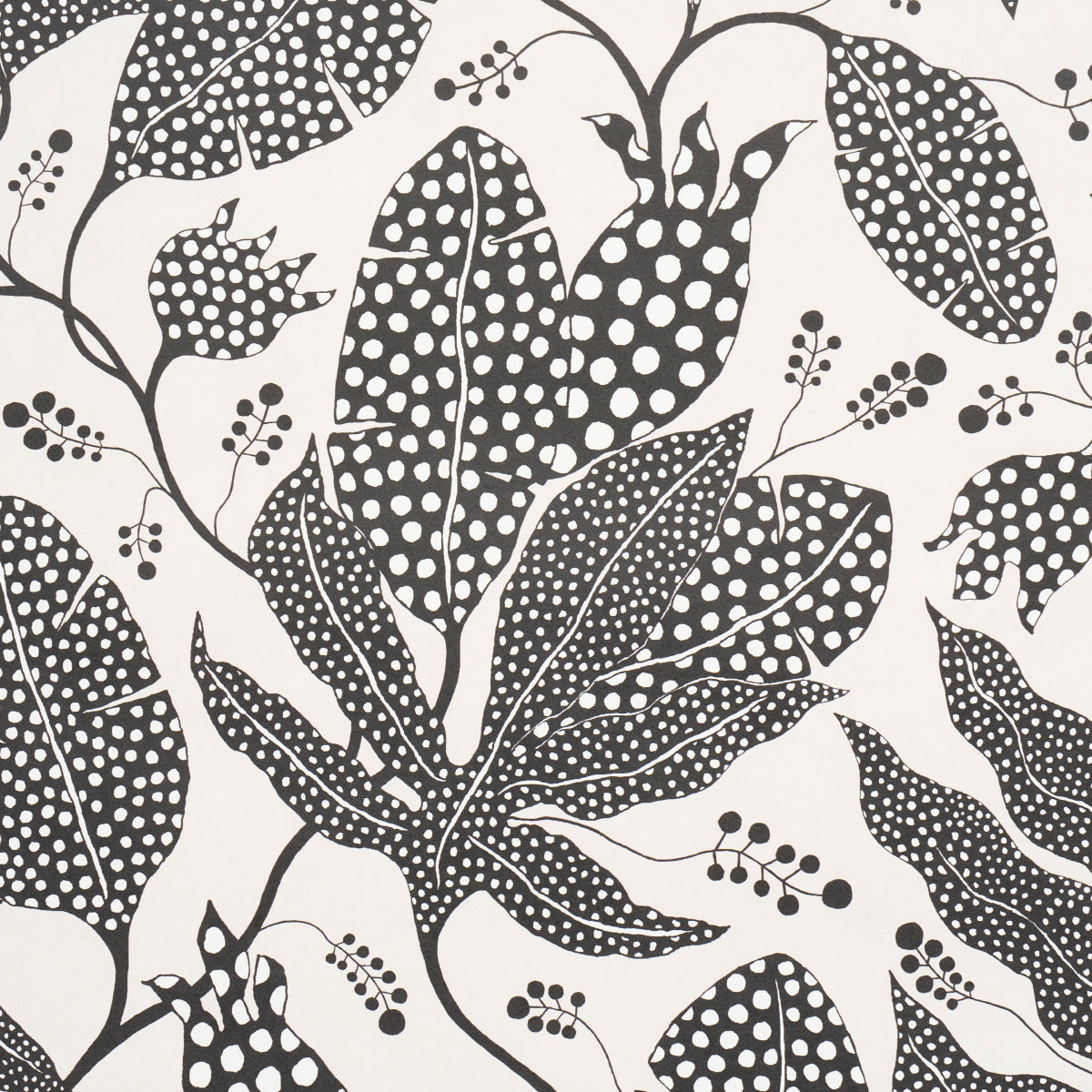 Black botanical leaf print with dotted fills on cream background; versatile fabric or wallpaper pattern.
