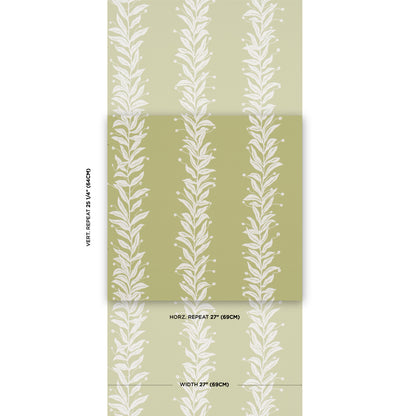Olive green wallpaper with white vertical leafy fern motifs in repeating stripes; folded sample sheet.
