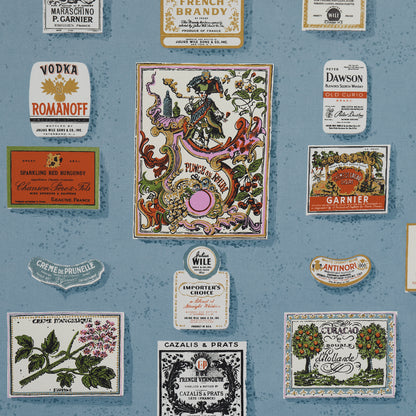 Backdrop design featuring a collage of vintage liquor bottle labels on a blue textured background; ornate typography & floral illustrations.