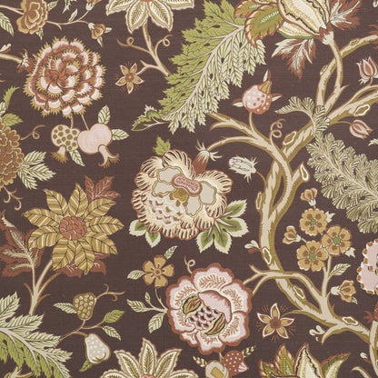 Brown floral tapestry fabric featuring large cream and pink blossoms with yellow accents and green leaves.