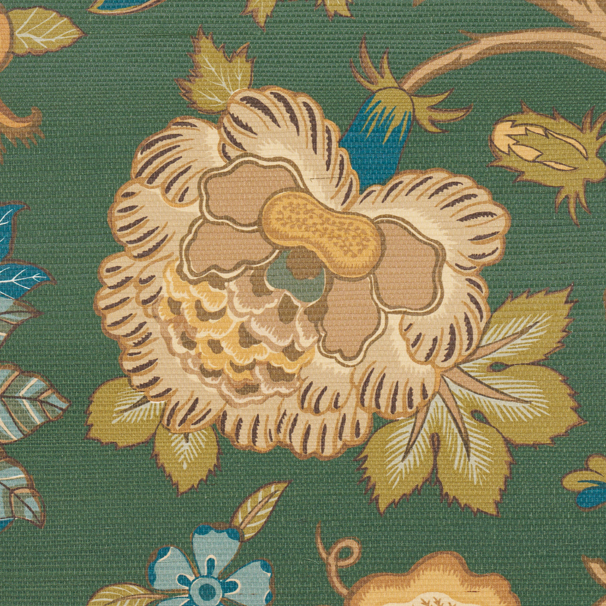 Green fabric with a large cream-gold flower and yellow-green leaves in a vintage floral pattern.