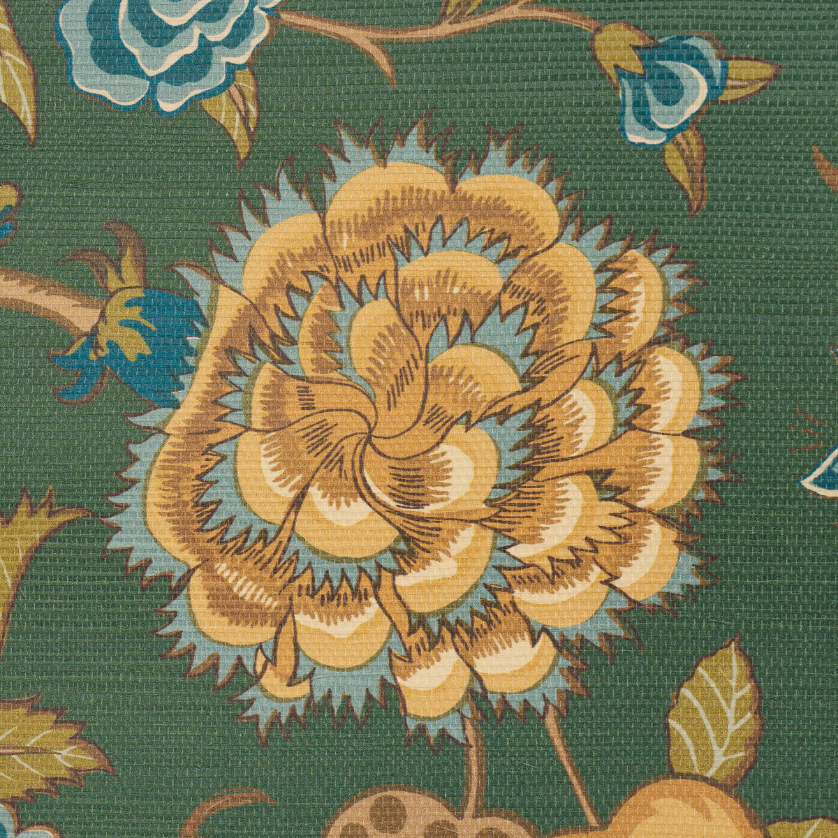 Green woven fabric featuring large yellow chrysanthemum blooms with teal accents; bold floral upholstery pattern.