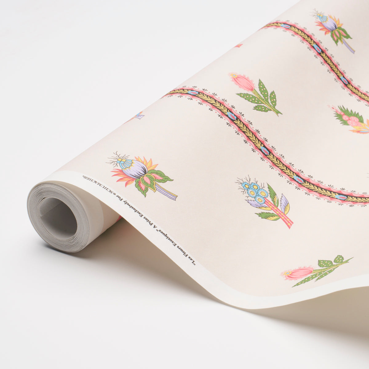 Cream wallpaper roll with pastel floral bouquets and decorative wavy border strips for walls.
