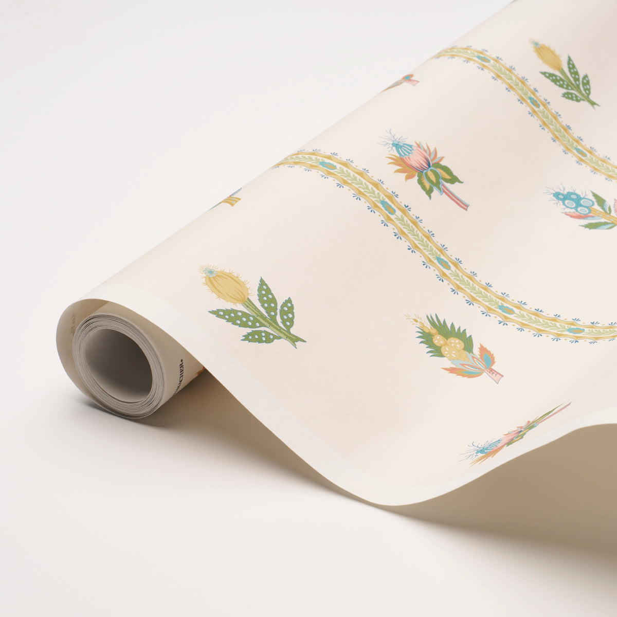 Cream wallpaper roll with pastel botanical motifs and yellow wavy stripe borders; decorative wall covering.