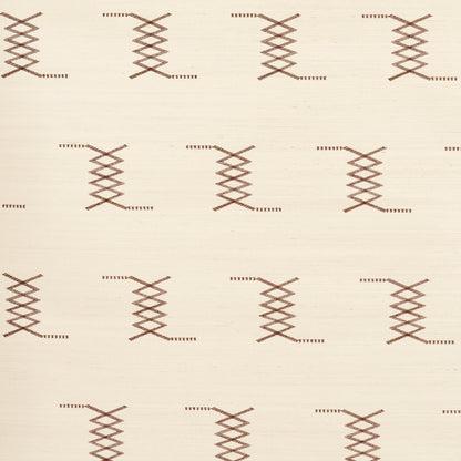 Cream-beige fabric with repeating brown cross-stitch lattice motifs; rustic geometric textile for upholstery.