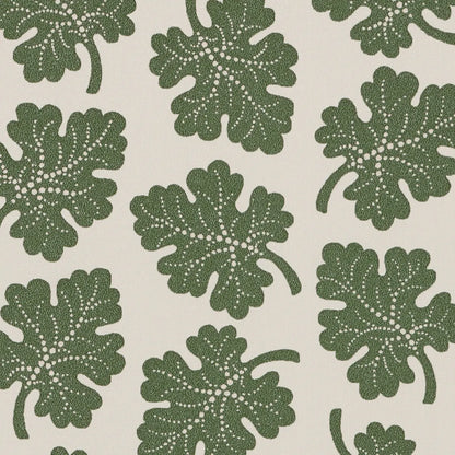 Pattern of green leaves on a beige background
