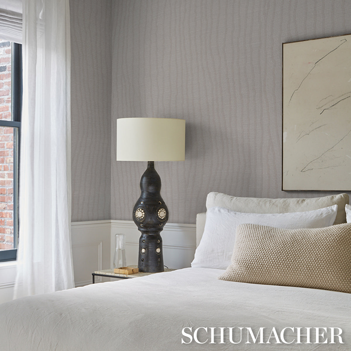 Gray patterned wallcovering with a subtle textured design.