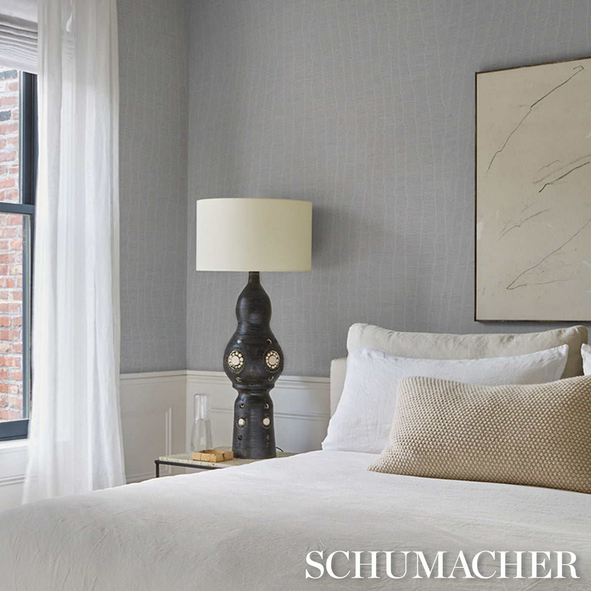 Whisper Blue wallcovering with a subtle pattern.